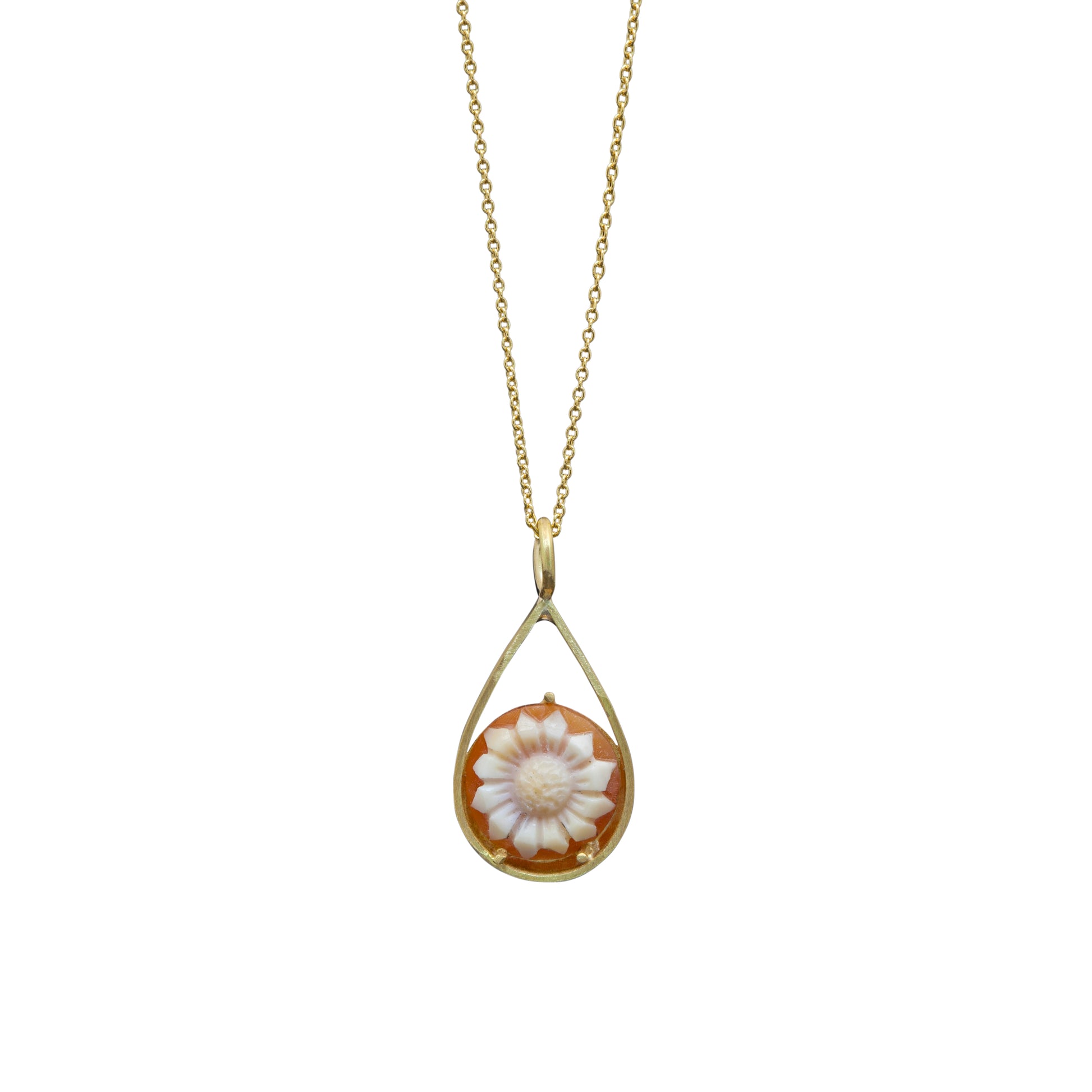 Hand-carved cameo pendant in 18k yellow gold showcasing timeless artistry by Bed of Stones Jewelry