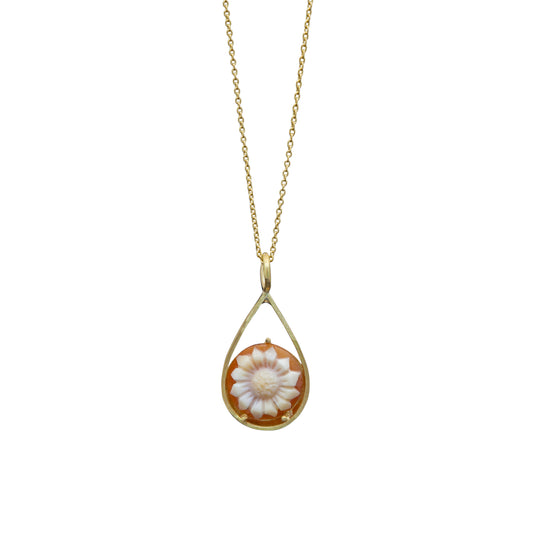 Hand-carved cameo pendant in 18k yellow gold showcasing timeless artistry by Bed of Stones Jewelry