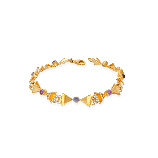 Delicate gold bracelet with bow charm by Bed of Stones Jewelry