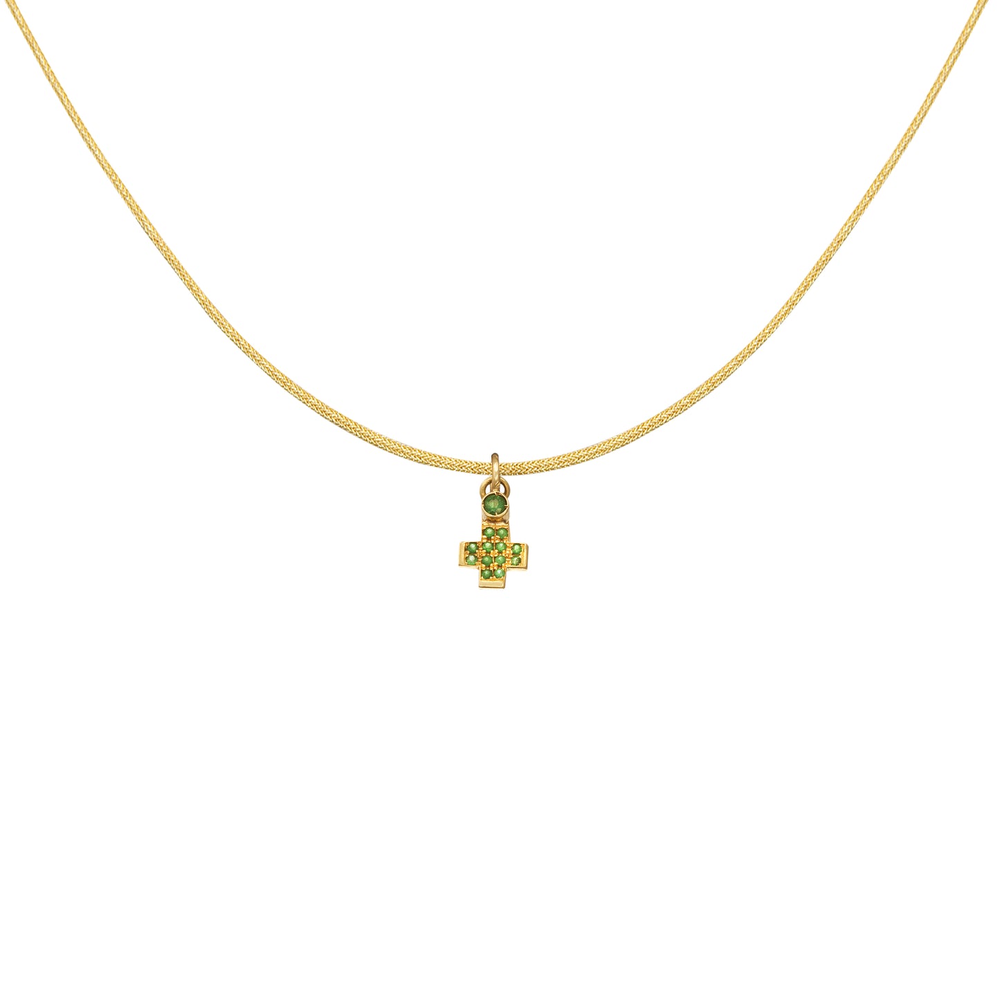 Small 18k yellow gold cross pendant embellished with 0.072ct and 0.044ct tsavorite gemstones by Bed of Stones Jewelry