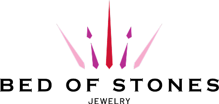 Bed of Stones Jewelry logo in elegant black and gold design