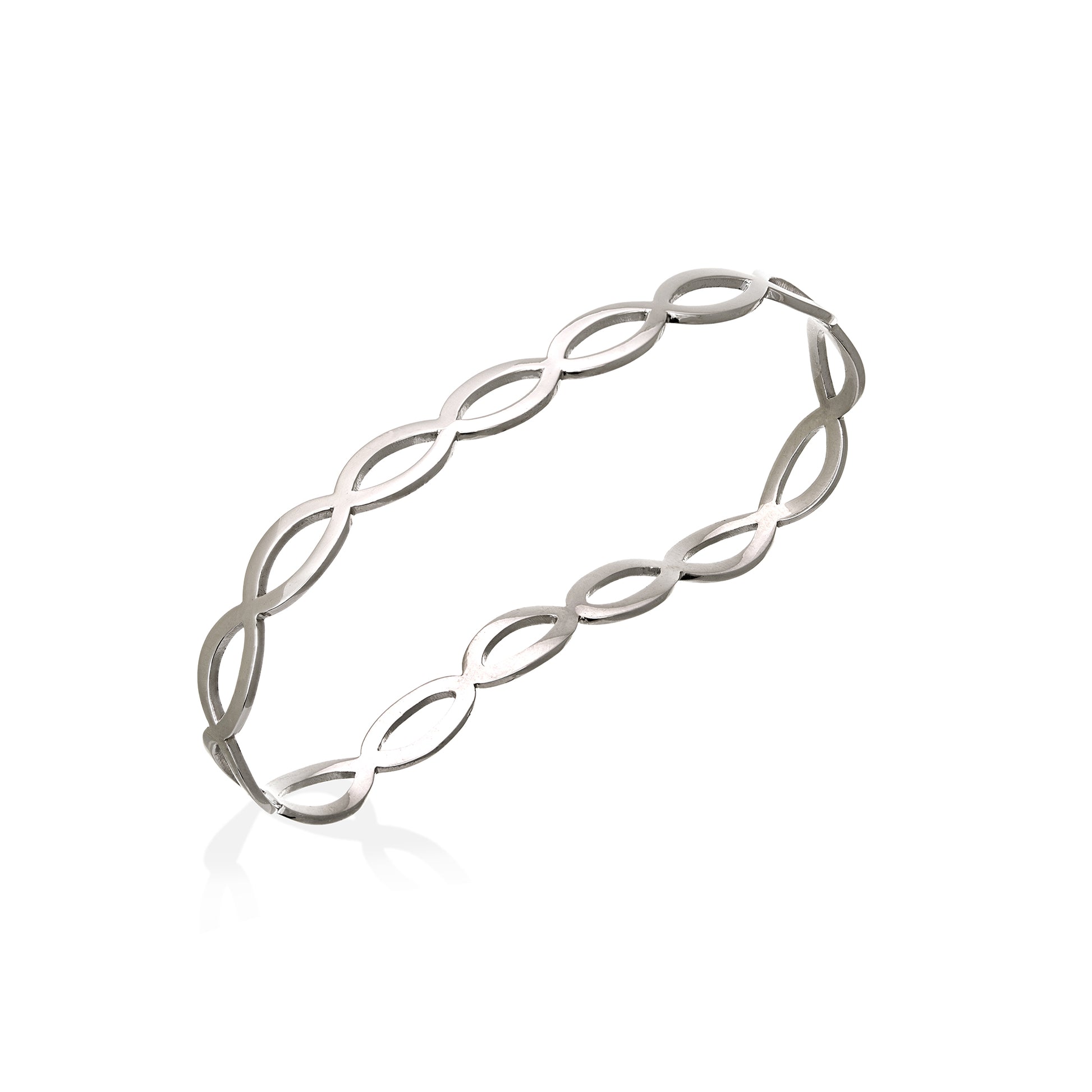 Palm-inspired gold bangle with organic curved design by Bed of Stones Jewelry