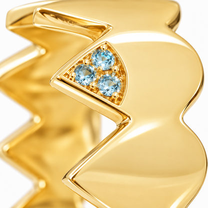 Close-up of round-cut blue topaz pavé setting on Azure Zigzag Band Sterling Silver & 18K Gold Plated by Bed of Stones Jewelry