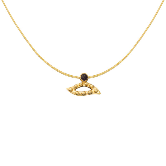 Pendant  eye Charm in 18 k yellow gold with iolite