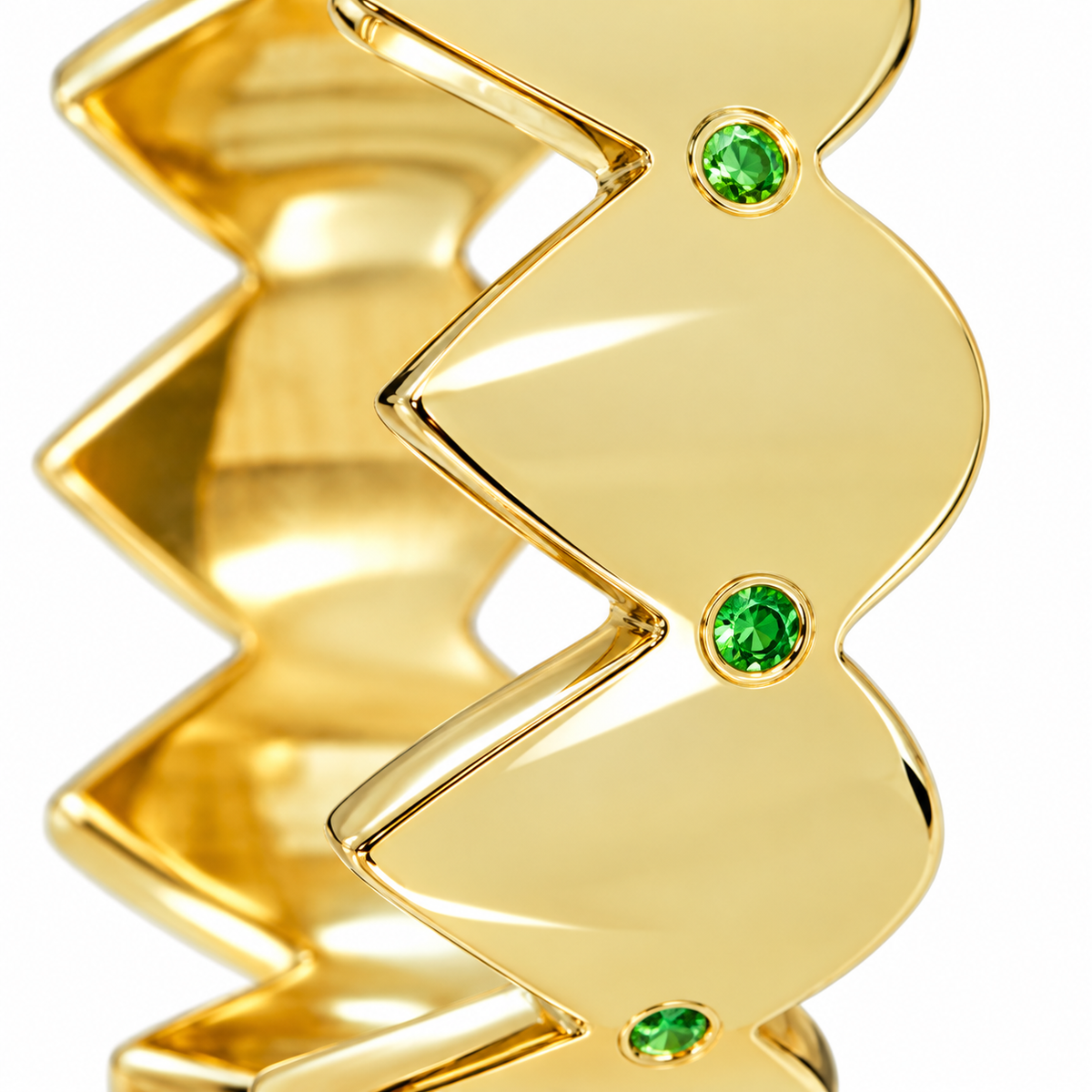 Close-up of round-cut tsavorite gypsy setting on Serrated Glow Band Sterling Silver & 18K Gold Plated by Bed of Stones Jewelry