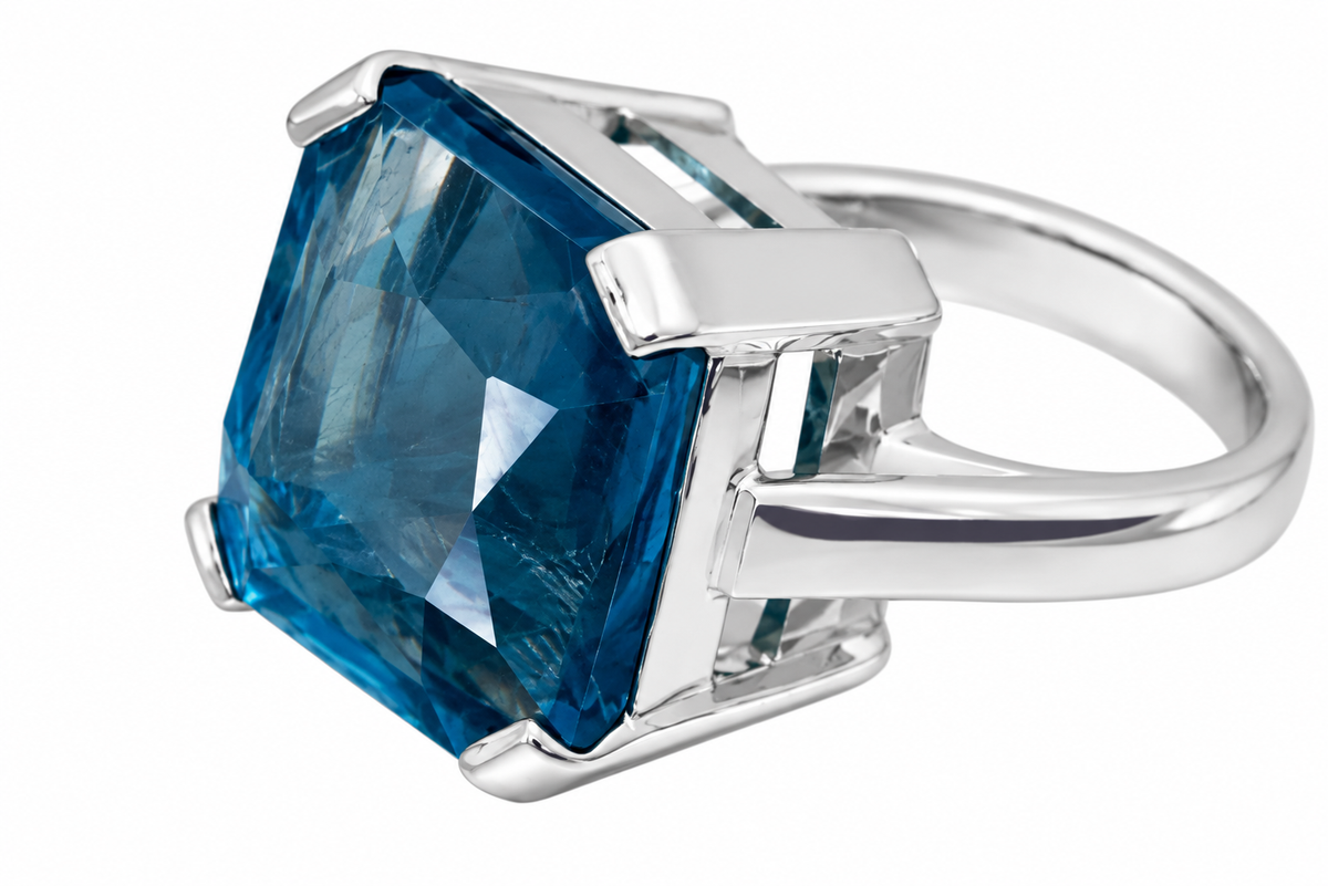 Close-up of asscher-cut apatite prong setting on Aqua Facet Sterling Silver (925) Ring by Bed of Stones Jewelry