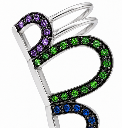 Close-up of multi-colour gemstone pavé setting on Chromatic Chain Ear Cuff by Bed of Stones Jewelry