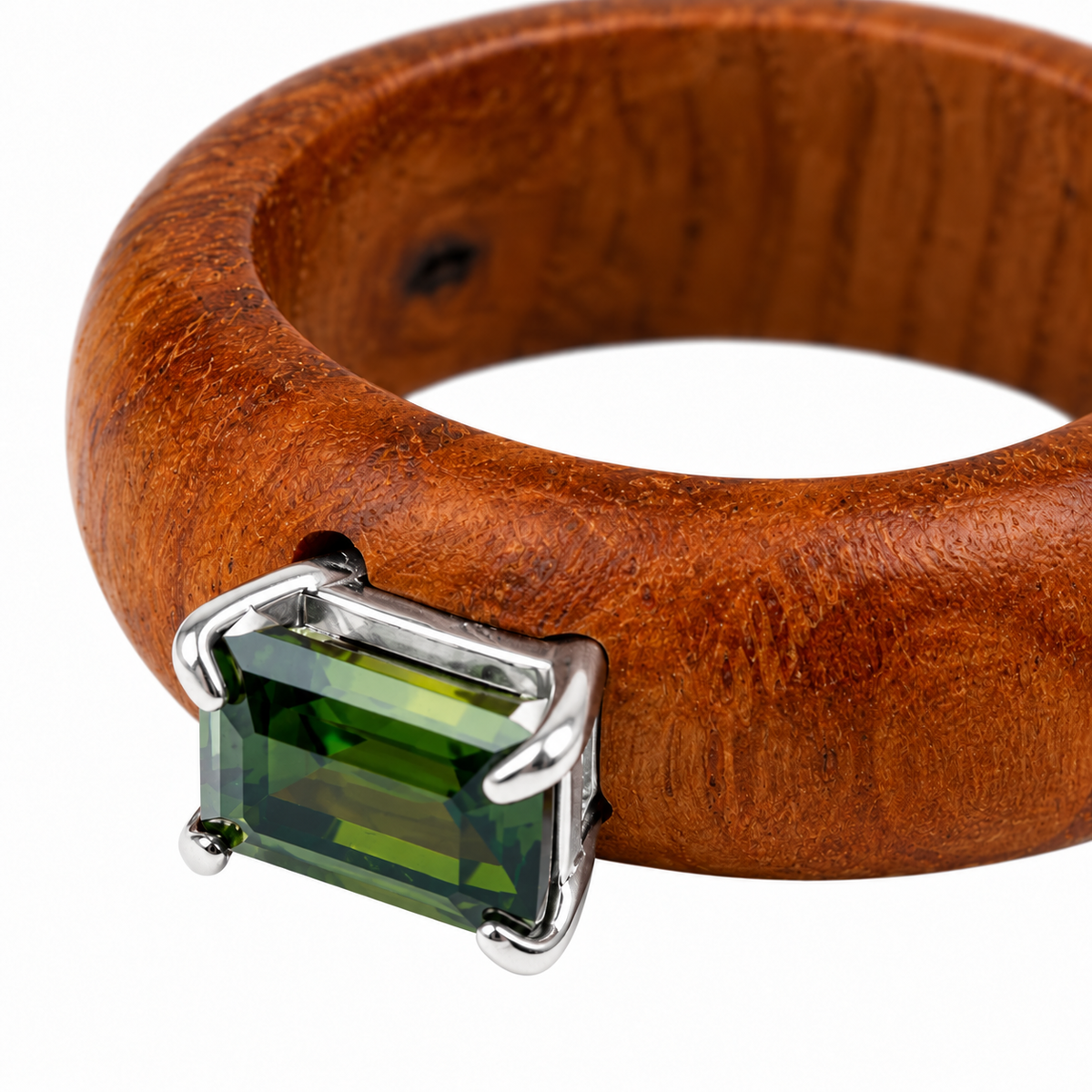 Close-up of emerald-cut green tourmaline prong setting on Earthline Olive Wood & Sterling Silver (925) Ring by Bed of Stones Jewelry