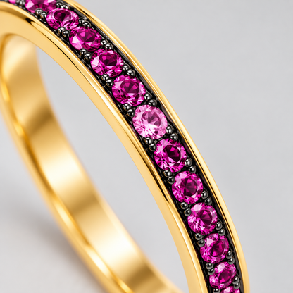 Close-up of round-cut pink sapphire pavé setting on Fuchsia Glow Band 18K Gold by Bed of Stones Jewelry