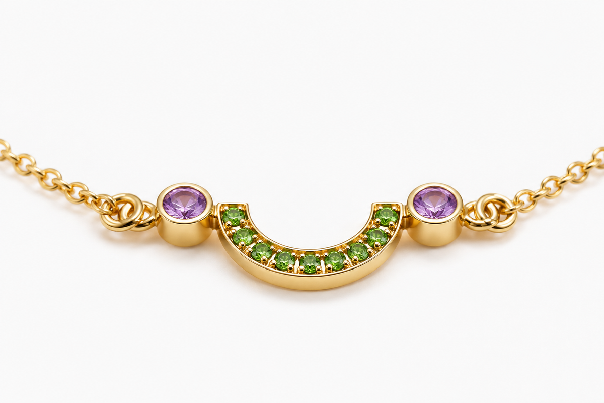 Close-up of tsavorite and amethyst pavé-bezel setting on Gem Light 18K Gold Bracelet by Bed of Stones Jewelry