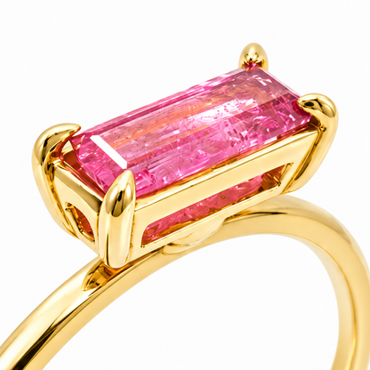 Close-up of baguette-cut pink tourmaline prong setting on Golden Geometry 18K Gold Ring by Bed of Stones Jewelry