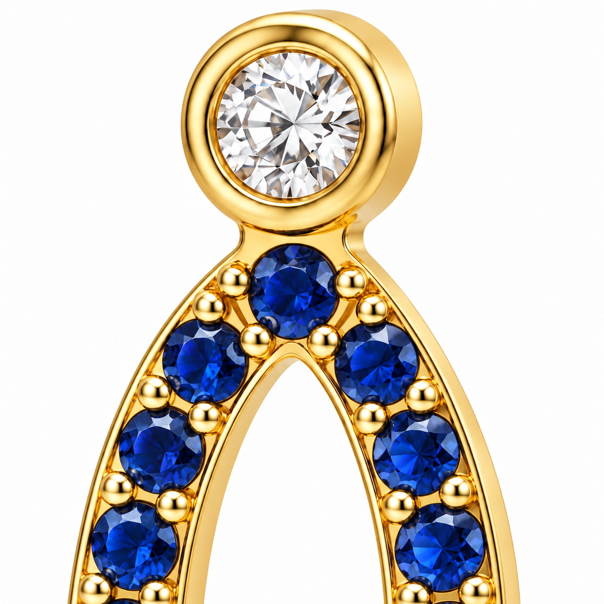Close-up of blue sapphire pavé and diamond bezel setting on Blue Sapphire Oval Drops Earrings by Bed of Stones Jewelry