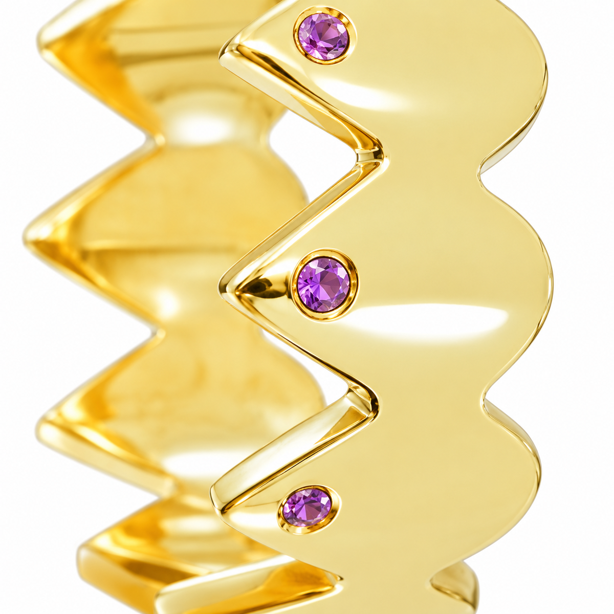 Close-up of round-cut amethyst gypsy setting on Serrated Glow Band Sterling Silver & 18K Gold Plated by Bed of Stones Jewelry
