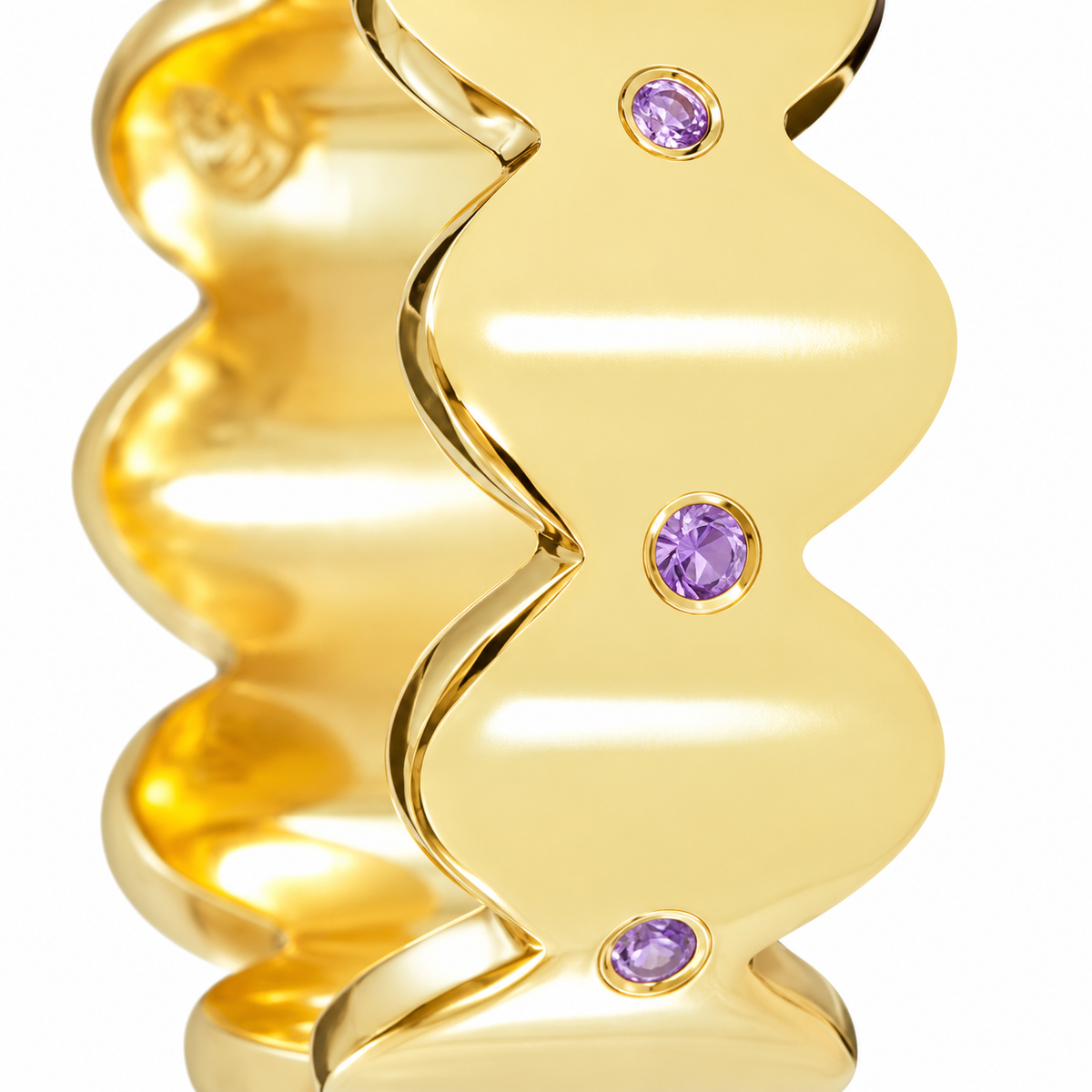 Close-up of round-cut amethyst gypsy setting on Lavender Echo Band Sterling Silver & 18K Gold Plated by Bed of Stones Jewelry