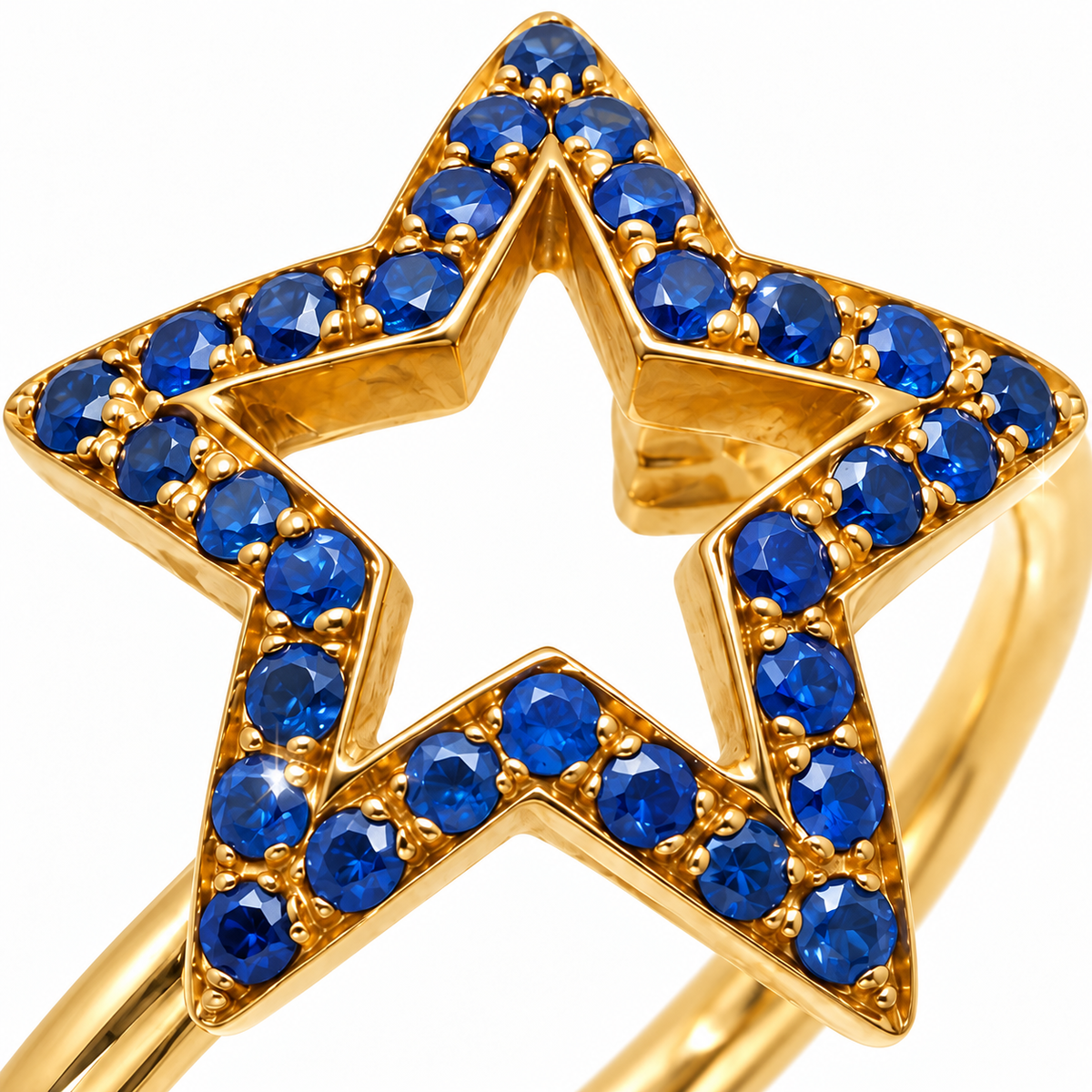 Close-up of round-cut blue sapphire pavé setting on Midnight Spark 18K Gold Ring by Bed of Stones Jewelry
