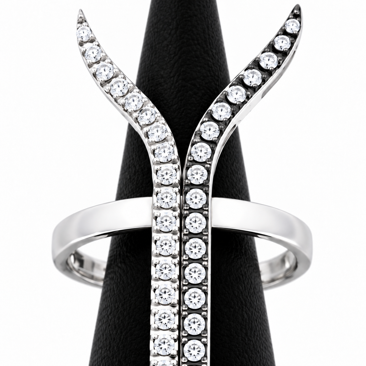Close-up of round-cut white diamond pavé and bezel setting on Monochrome Flow Ring 18K White Gold by Bed of Stones Jewelry