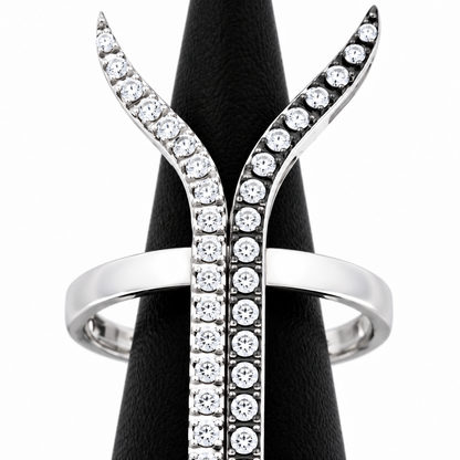 Close-up of round-cut white diamond pavé and bezel setting on Monochrome Flow Ring 18K White Gold by Bed of Stones Jewelry