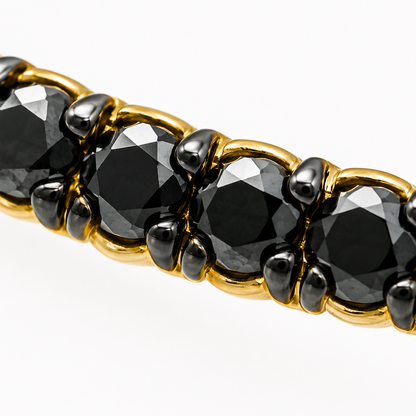 Close-up of black diamond pavé detail on Noir Pulse 18K Gold Ear Cuff by Bed of Stones Jewelry