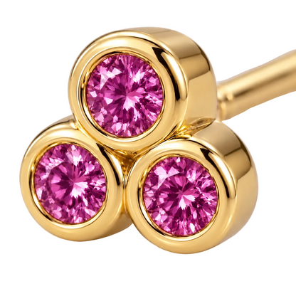 Close-up of pink sapphire bezel setting on Pink Trillium Earrings by Bed of Stones Jewelry