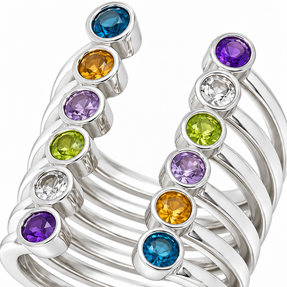 Close-up of round-cut multicolour gemstone bezel setting on Prismatic Lines Ring Sterling Silver by Bed of Stones Jewelry