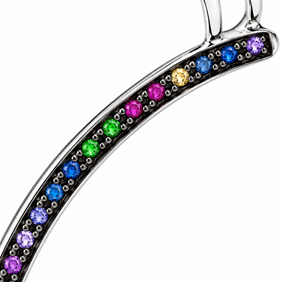 Close-up of multicolour gemstone pavé setting on Radiant Curve Ear Cuff by Bed of Stones Jewelry
