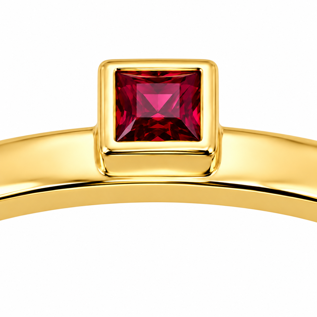 Close-up of princess-cut ruby bezel setting on Solo Square 18K Gold Ring by Bed of Stones Jewelry