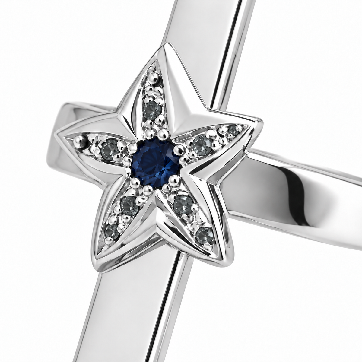 Close-up of round-cut blue sapphire gypsy and pavé setting on Stellar Audience Ring Sterling Silver by Bed of Stones Jewelry