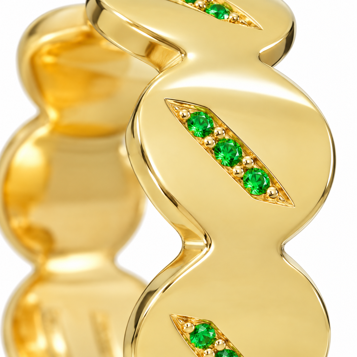 Close-up of round-cut tsavorite pavé setting on Tsavorite Flow Sterling Silver Ring by Bed of Stones Jewelry