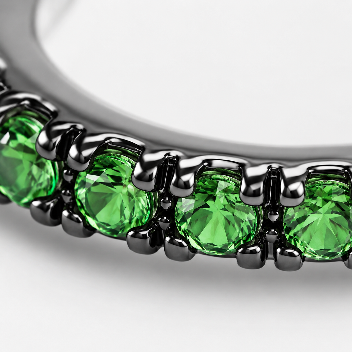Close-up of tsavorite pavé detail on Tsavorite Whisper Sterling Silver Ear Cuff by Bed of Stones Jewelry