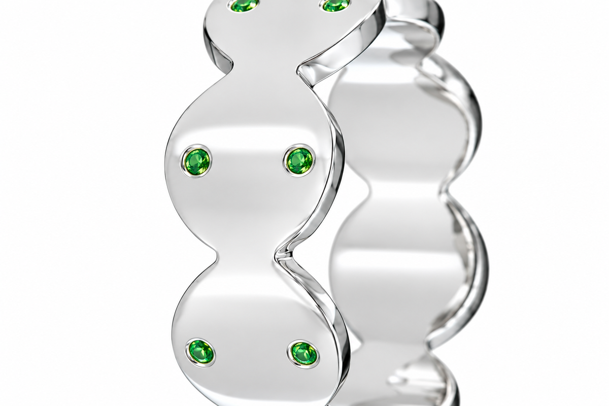 Close-up of round-cut tsavorite gypsy setting on Verdant Code Band Sterling Silver by Bed of Stones Jewelry