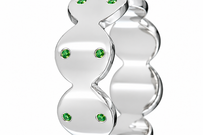 Close-up of round-cut tsavorite gypsy setting on Verdant Code Band Sterling Silver by Bed of Stones Jewelry