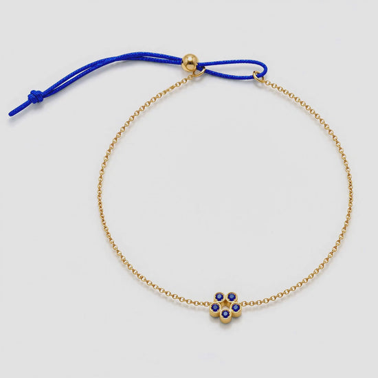 Video of Rosette 18K Gold Bracelet by Bed of Stones Jewelry, showing adjustable sliding bead closure mechanism