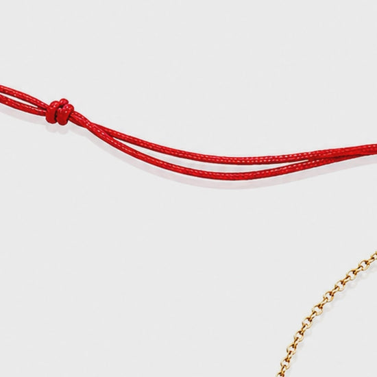 Lip Luxe 18K Gold Bracelet by Bed of Stones Jewelry, close-up video of sliding bead closure in use