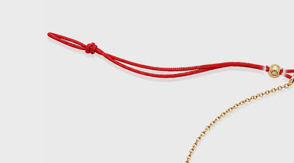 Lip Luxe 18K Gold Bracelet by Bed of Stones Jewelry, close-up video of sliding bead closure in use